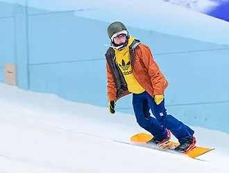 Snowboarder on the slope at Chill Factor<sup>e</sup>